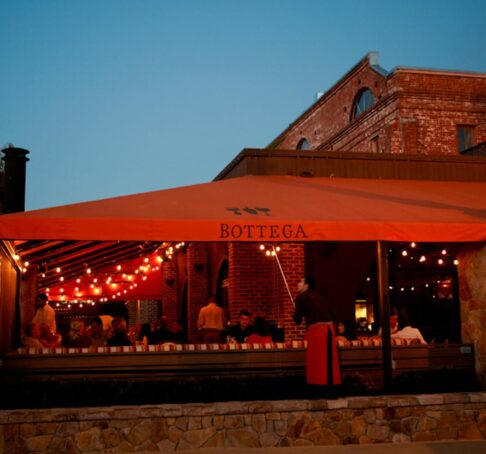 exterior of the bottega at night.