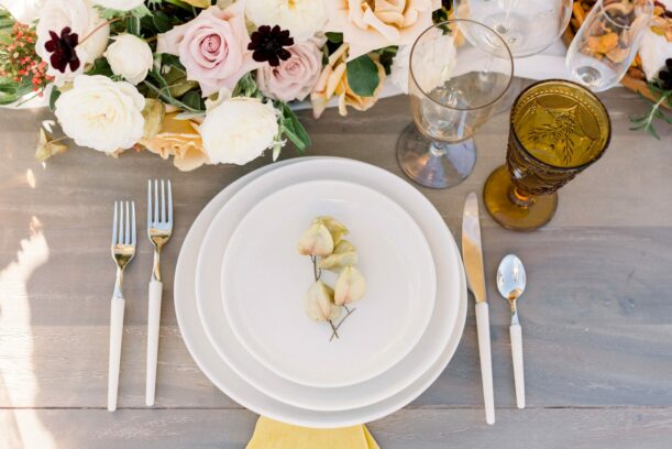 wedding plate setting with flowers.