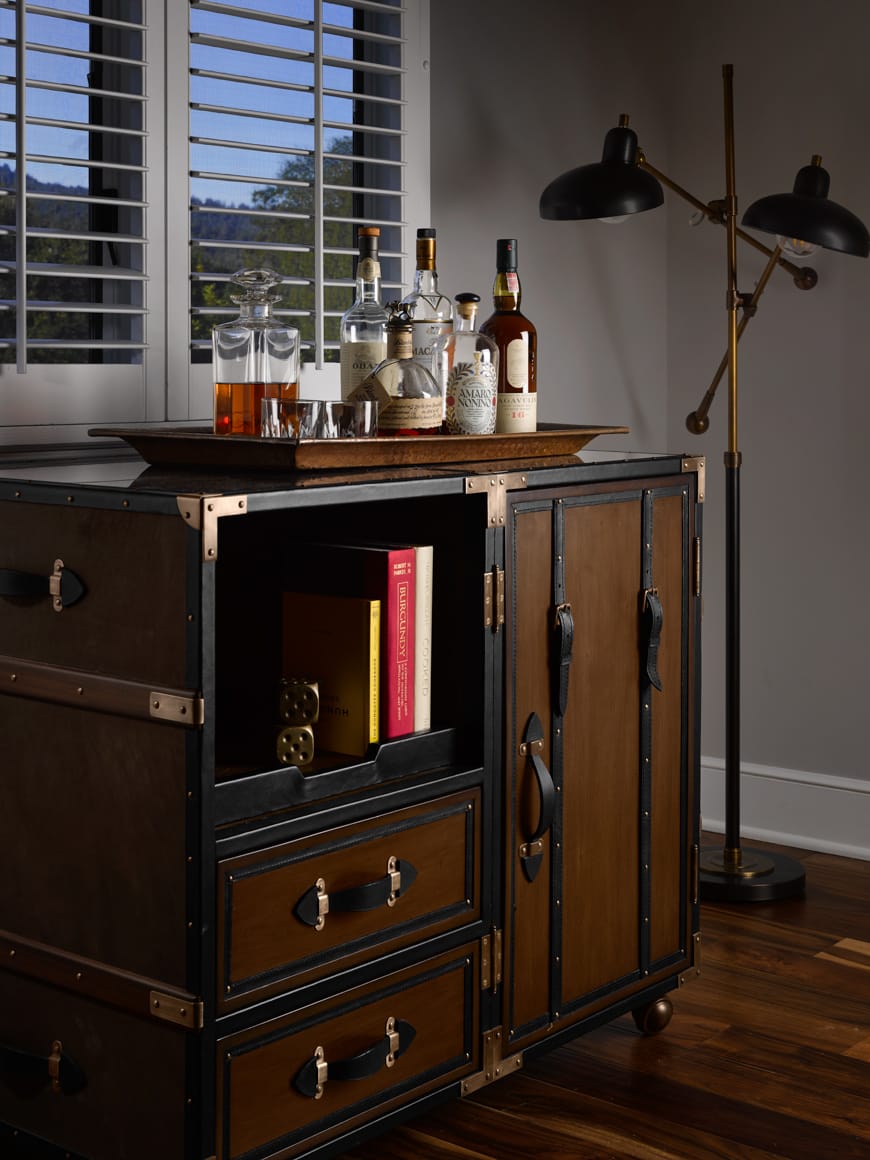 dresser with alcohol in the vintage house.